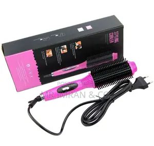 Dual-Purpose Tool for Straightening and Curling Hair.