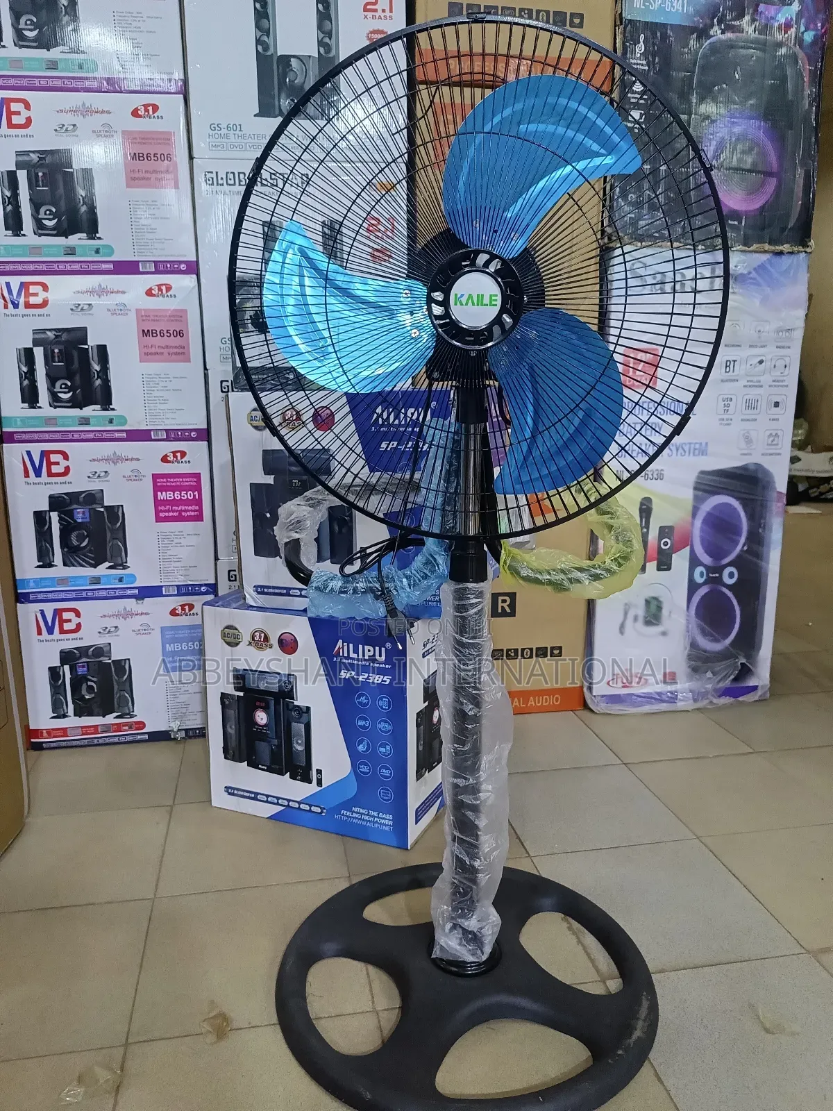 Kaile Brand Pedestal Standing Fan With Blue Blades.