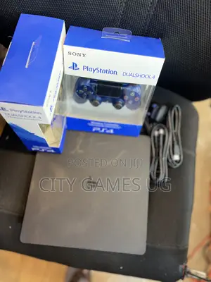 Sony Playstation 4 Slimconsolewith 2controllers, Accessories and Games