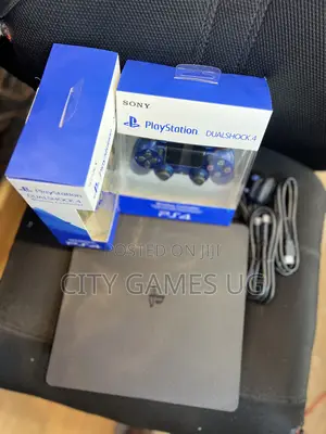 Sony Playstation 4 Slimconsolewith 2controllers, Accessories and Games