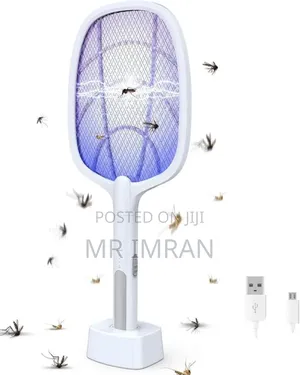 Electric Bug Zapper Racket With a Charging Base.