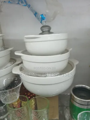 Set of White Ceramic Casserole Serving Dishes With Covers.