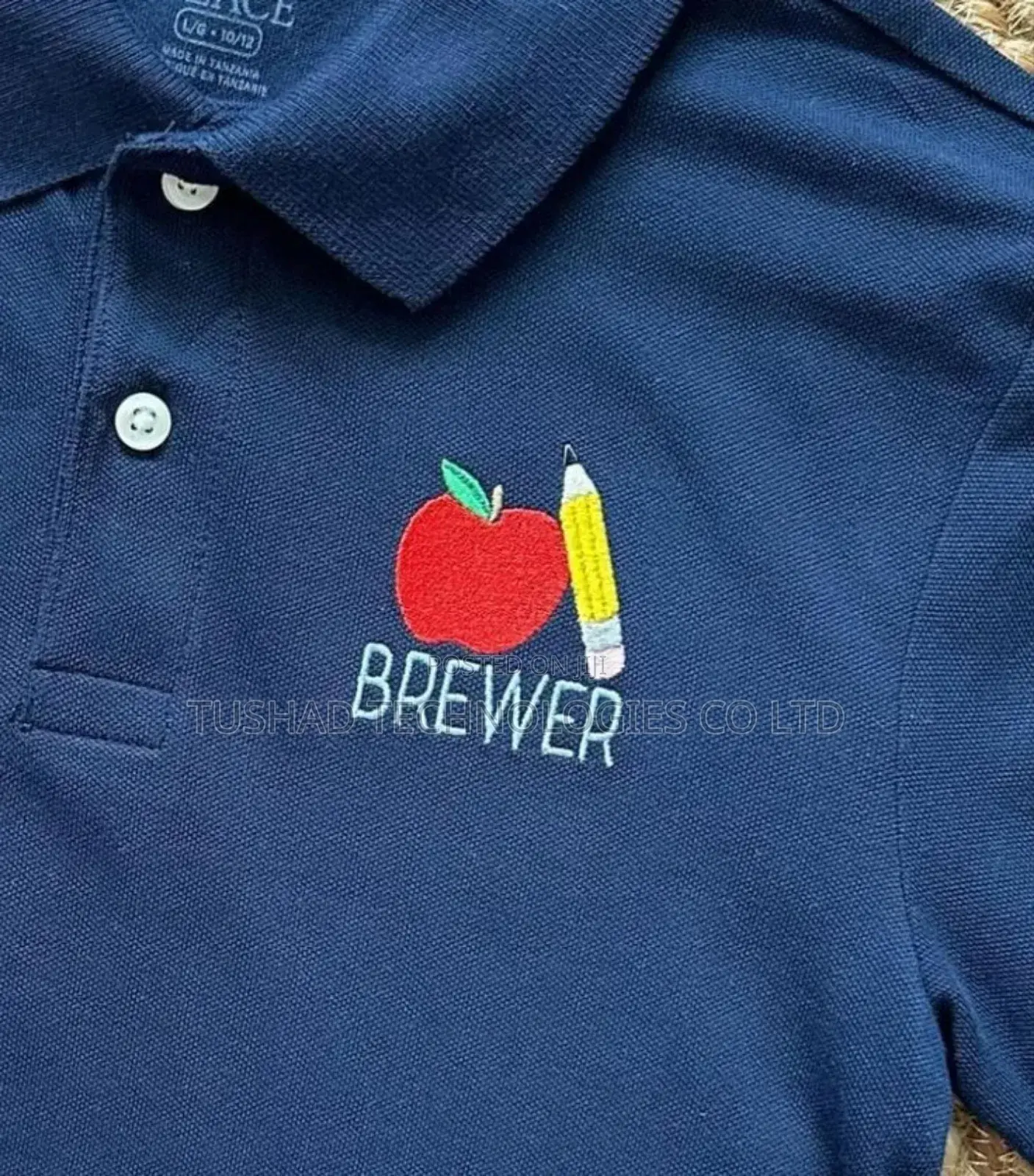 Embroidery Printing, Branding Uniforms T-Shirts Sweaters Capes Shirts