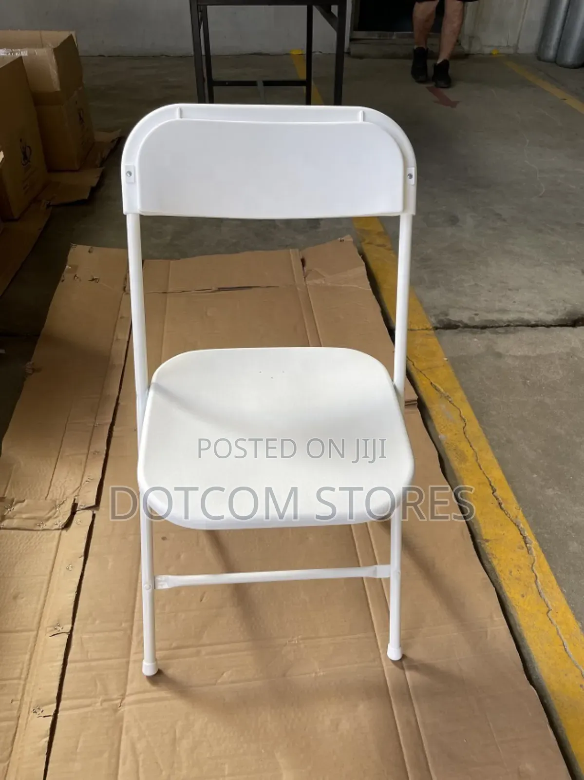 White Plastic and Steel Folding Chair