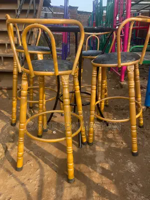 A Set of Bar Stools and Chair