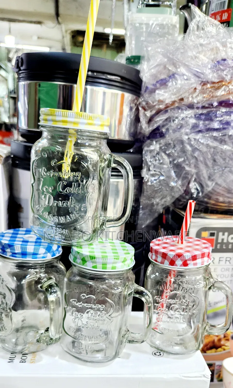 Glass Mason Jar Mugs Equipped With Handles, Lids, and Straws
