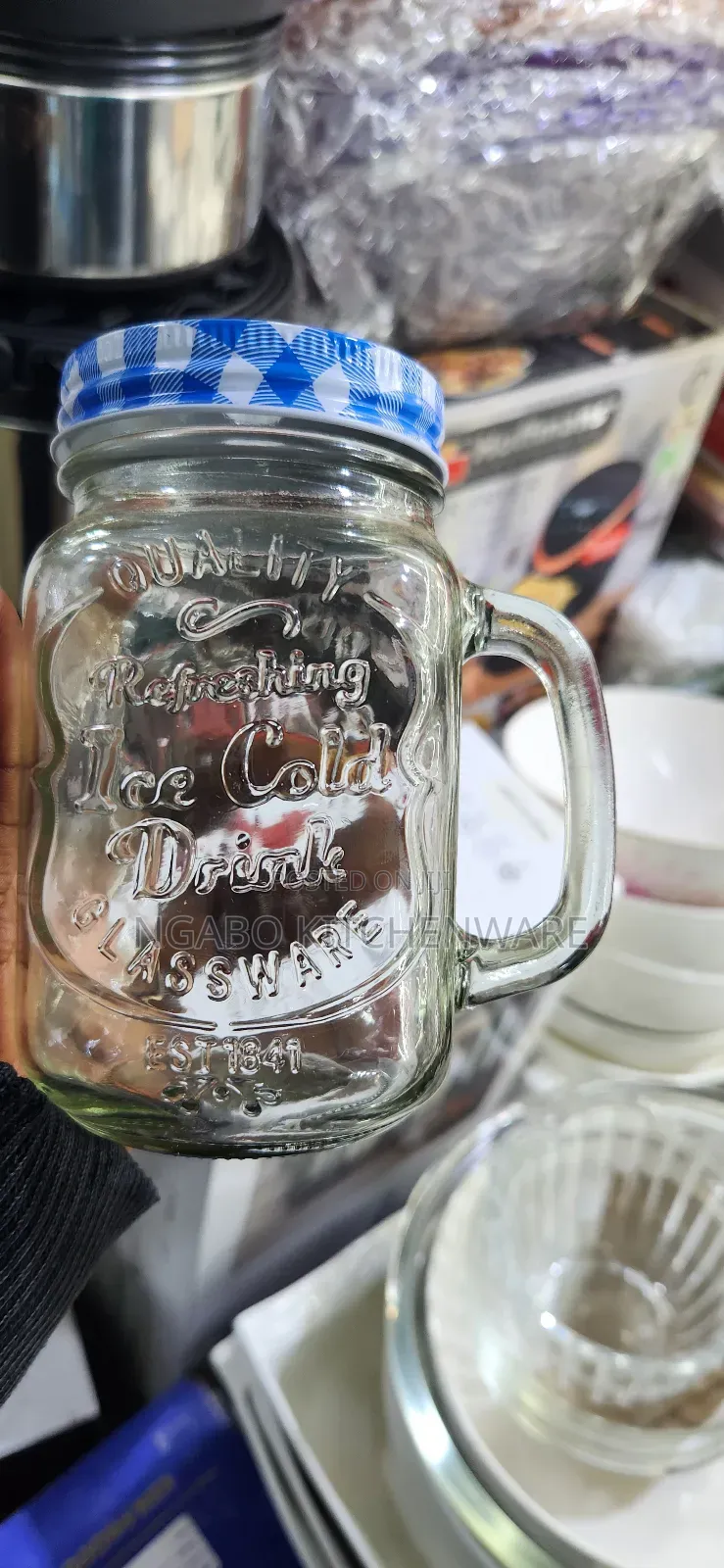 Glass Mason Jar Mugs Equipped With Handles, Lids, and Straws
