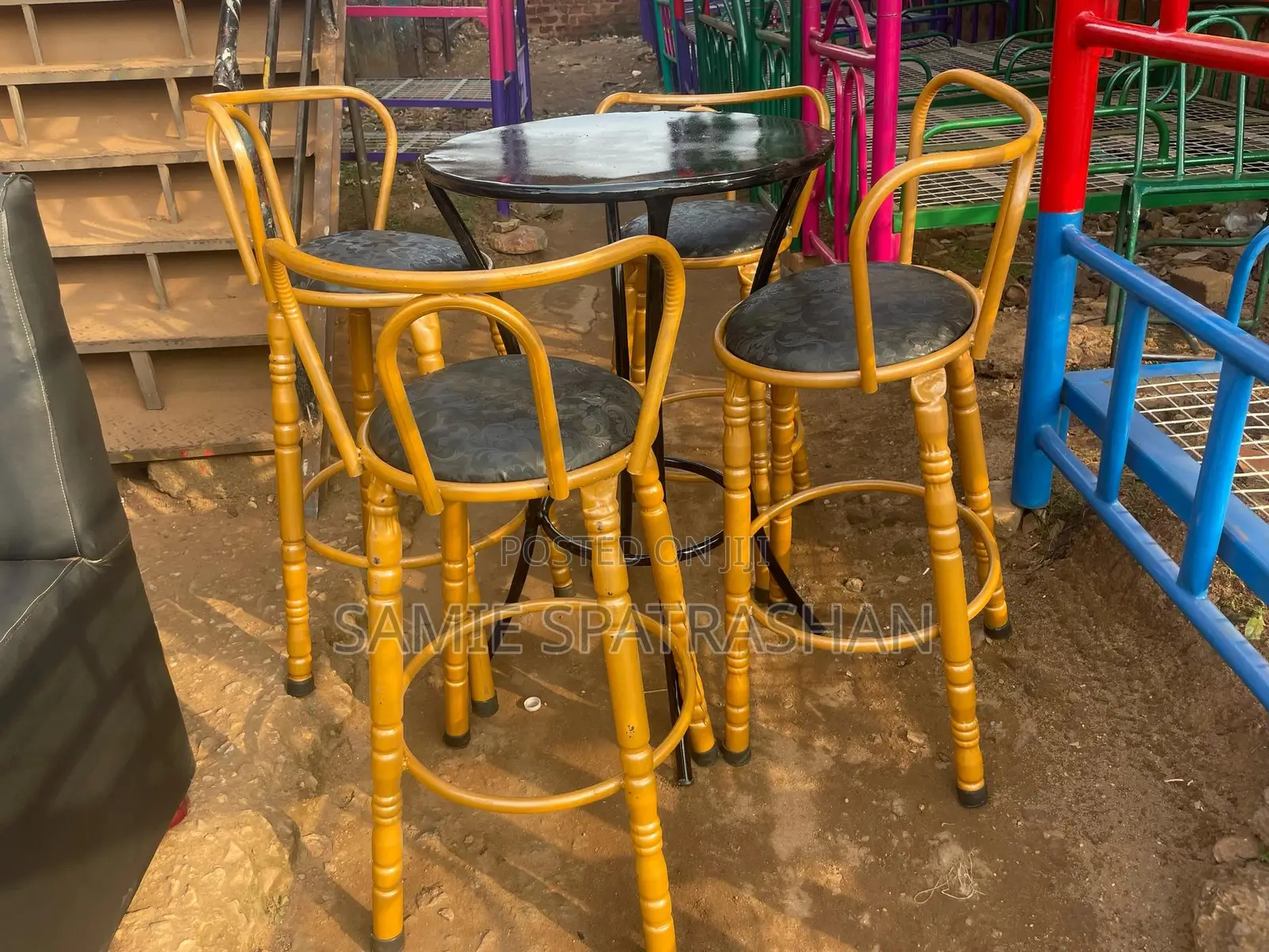 A Set of Bar Stools and Chair