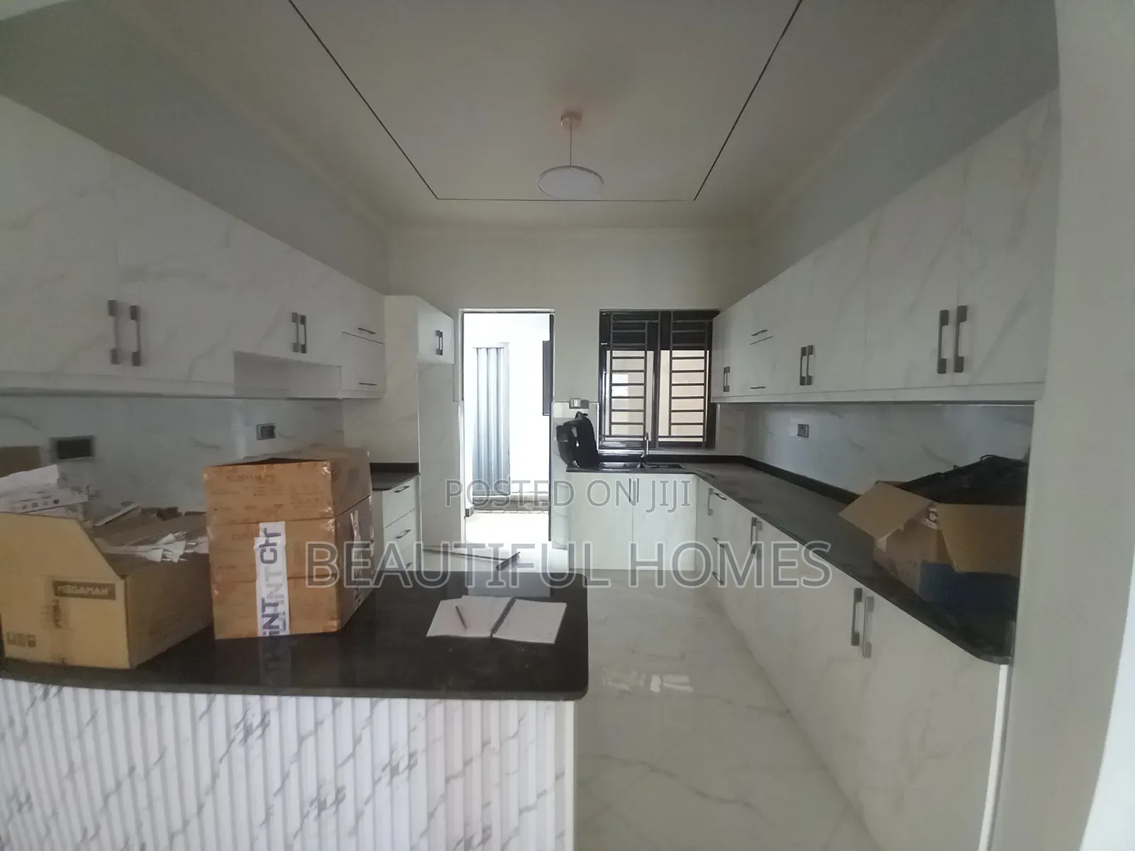 Furnished 4bdrm Bungalow in Kira for sale
