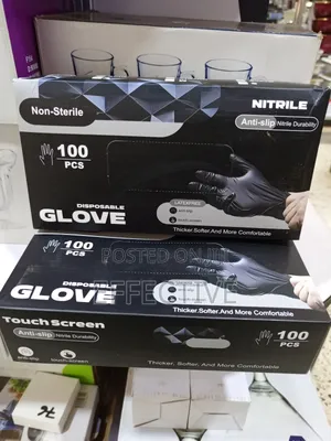 Non-Sterile, Black, Disposable Nitrile Gloves.