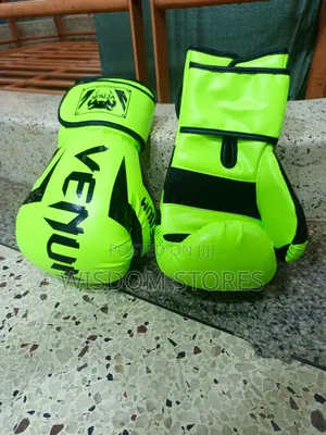 Venum Elite Boxing Gloves in a Neon Yellow Colorway