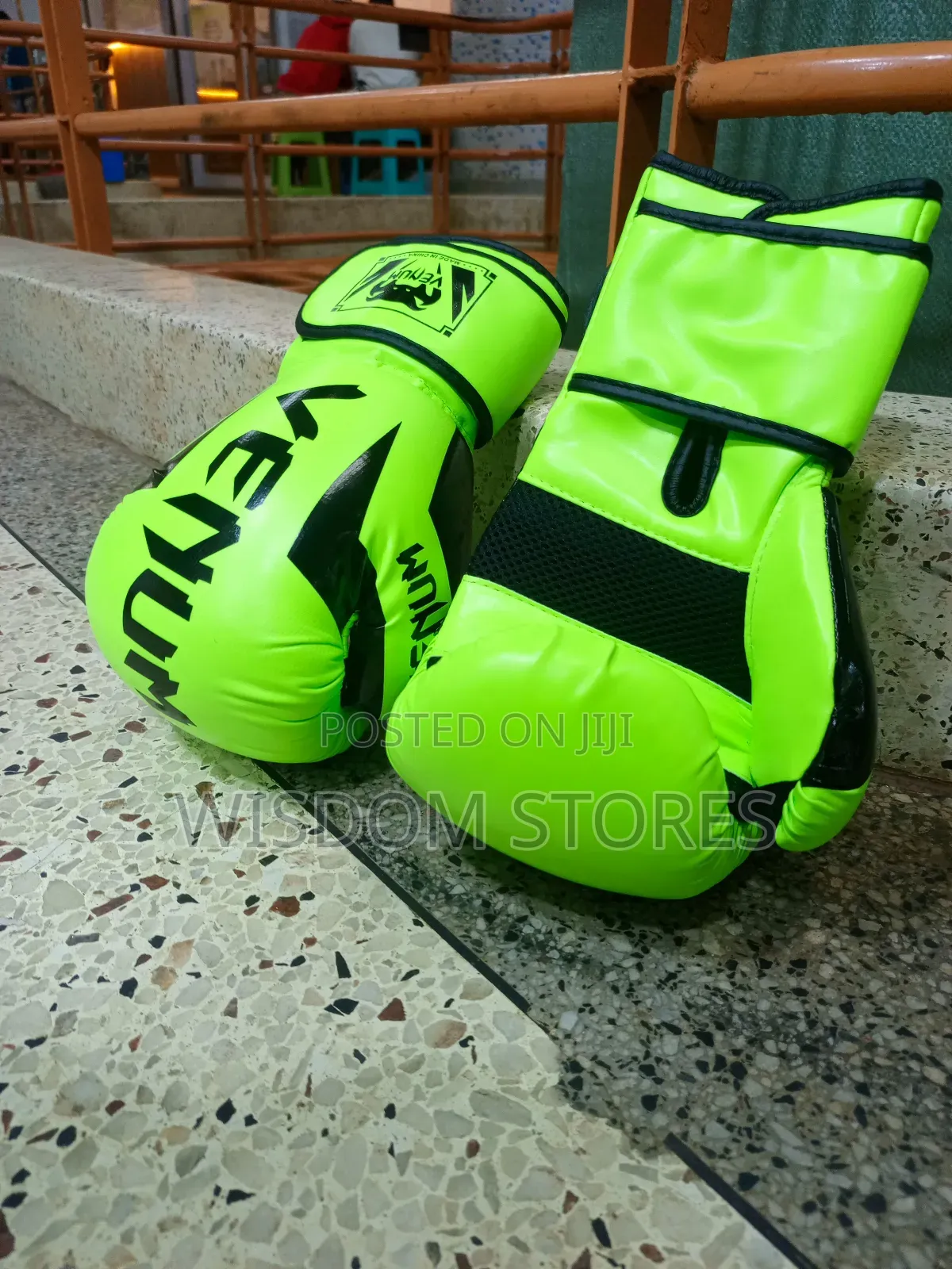 Venum Elite Boxing Gloves in a Neon Yellow Colorway