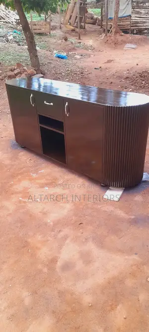 Well Finished Curved Tv Stand in Coffee Brown With 2 Shatters 1drawer