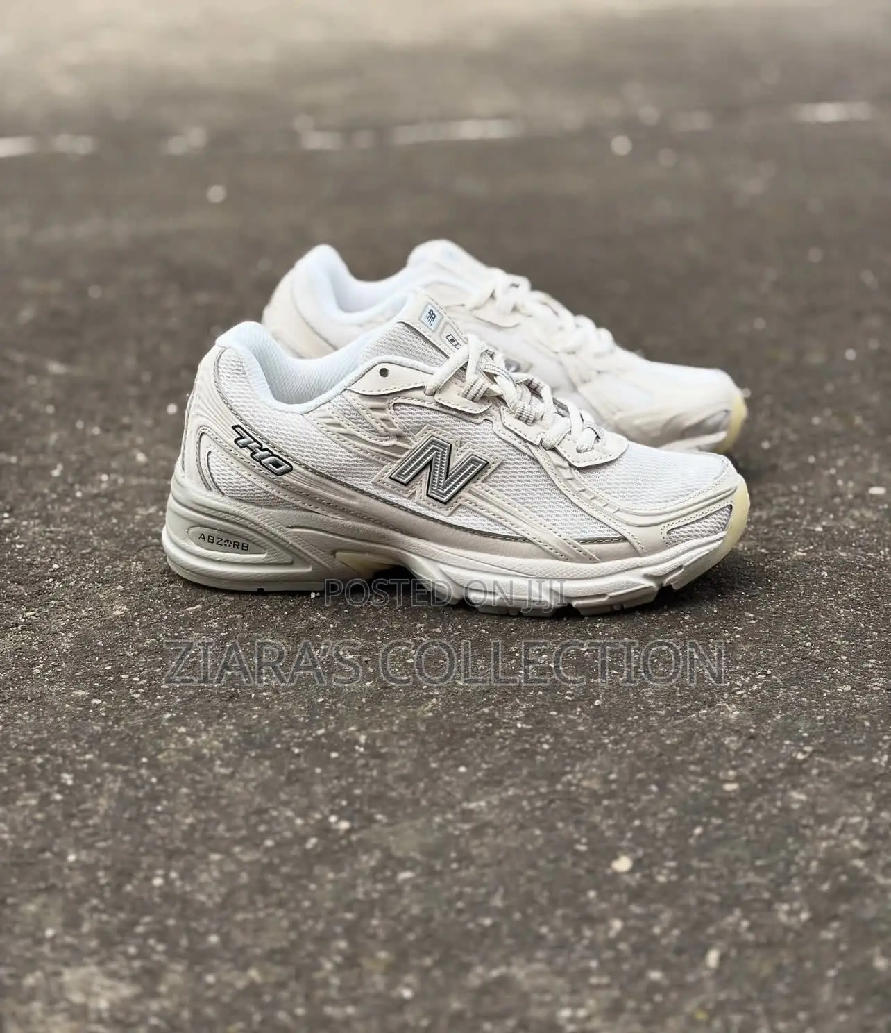 White New Balance 740 Trainers