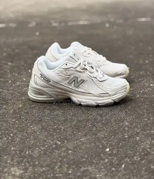 White New Balance 740 Trainers