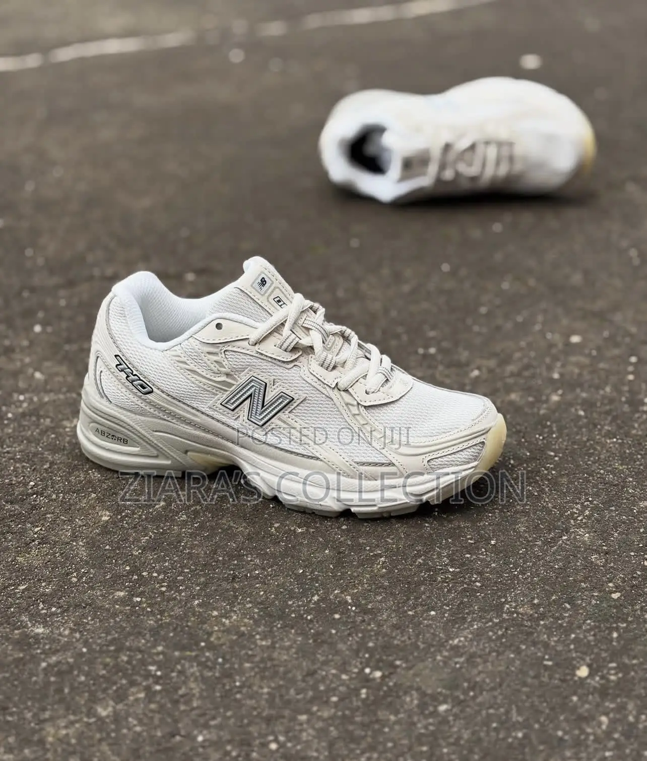 White New Balance 740 Trainers