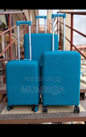 Three Piece Set of Teal , Hard Shell Trolley Suit Case