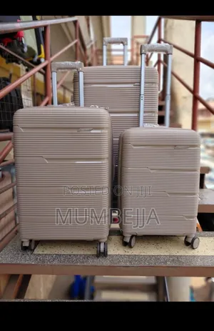 Light Tan Good Partner Suitcase With White Handles Suit Case