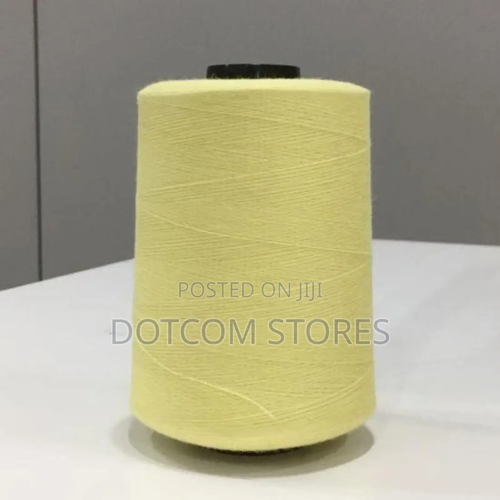 Cone of Yellow Yarn
