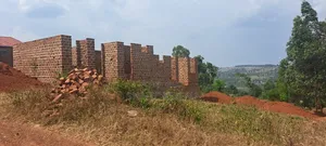 50 by 100 in Kyasanku Mpigi