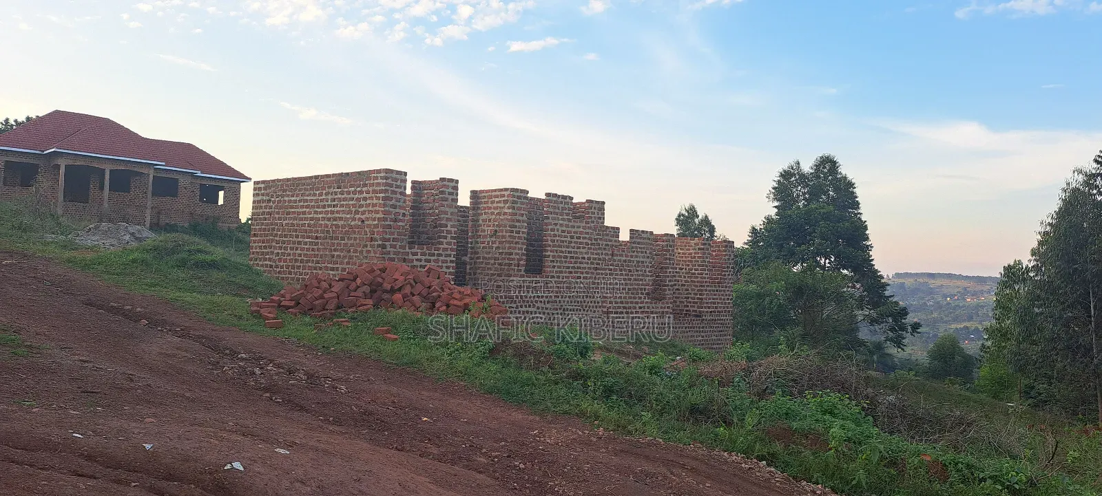 50 by 100 in Kyasanku Mpigi