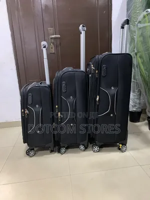Set of Black Fabric Traveling Suitcases