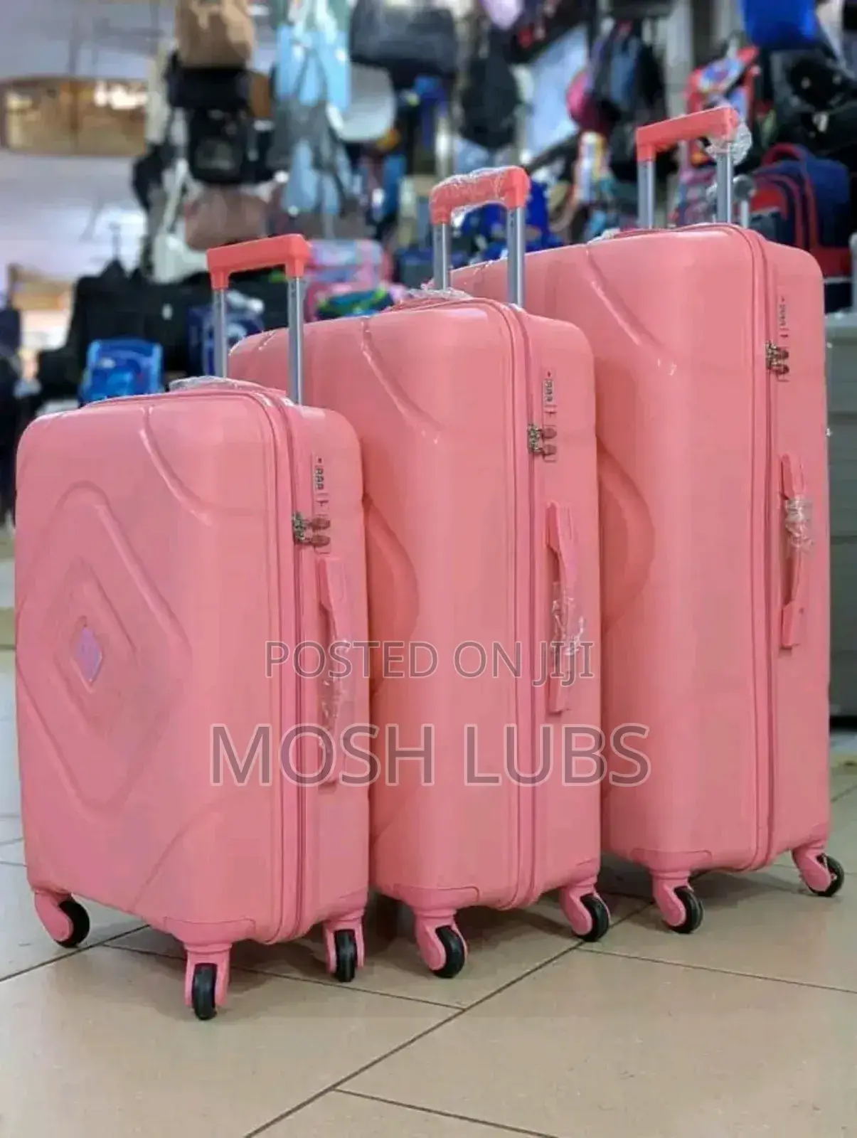 A Pack of 3 Plastic Travel Suitcases