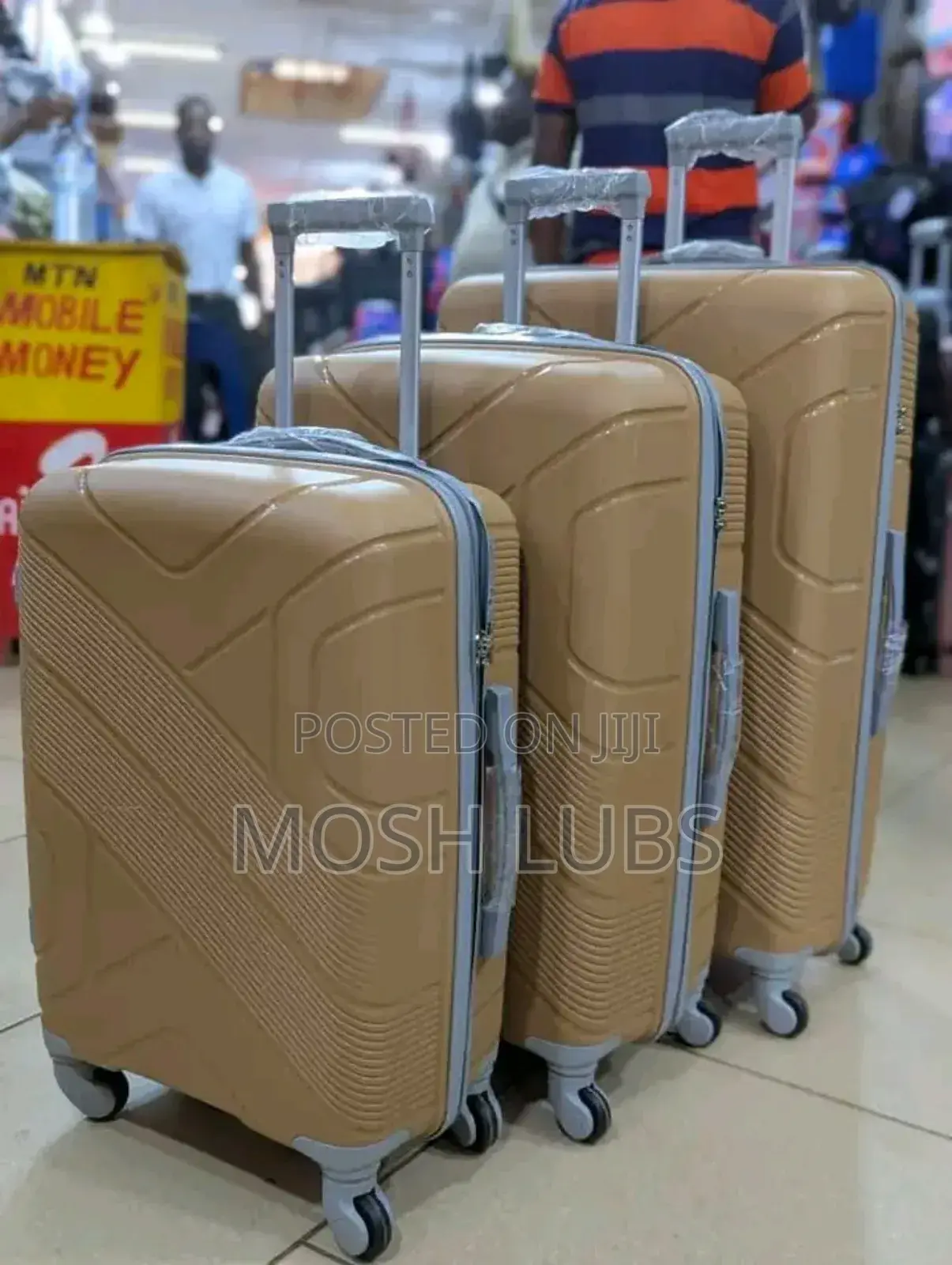 A Pack of 3 Plastic Travel Suitcases