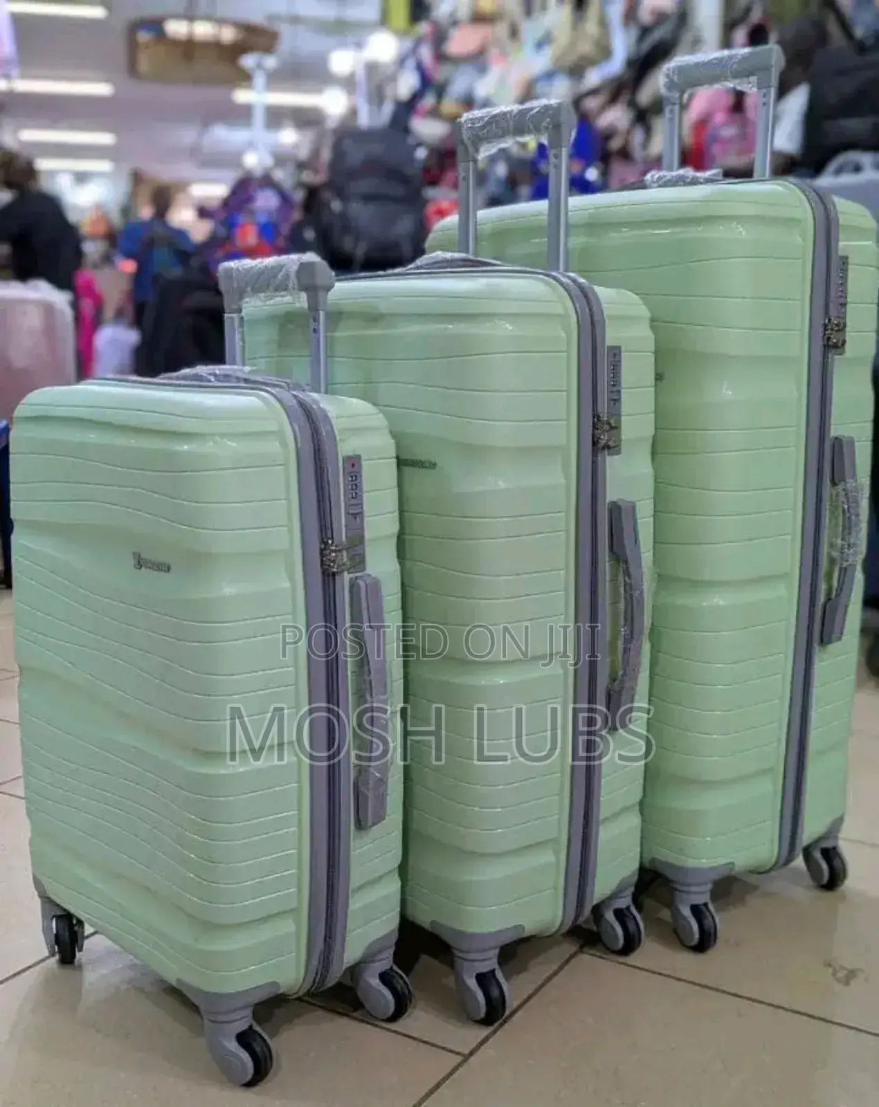 A Pack of 3 Plastic Travel Suitcases