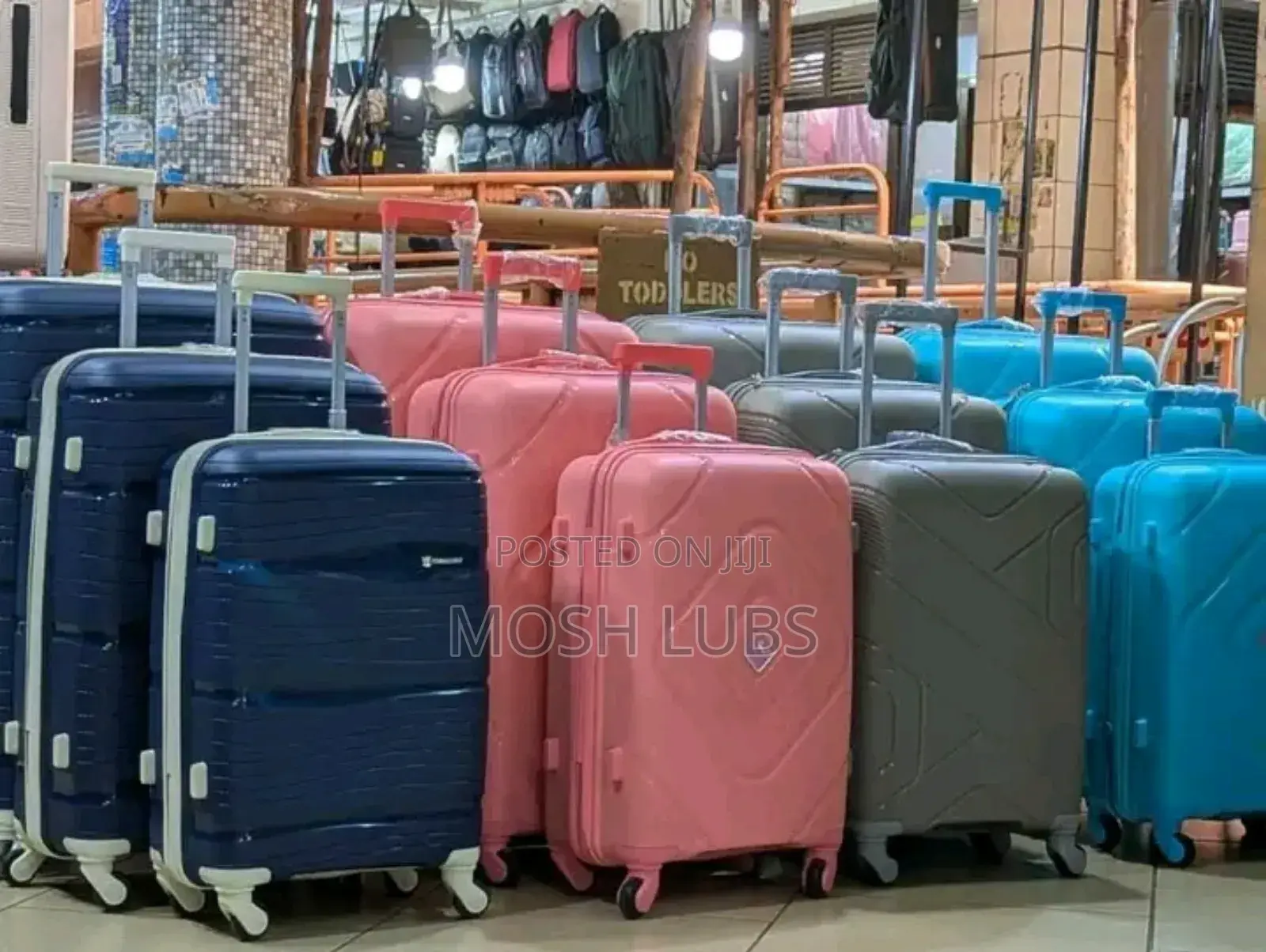 A Pack of 3 Plastic Travel Suitcases