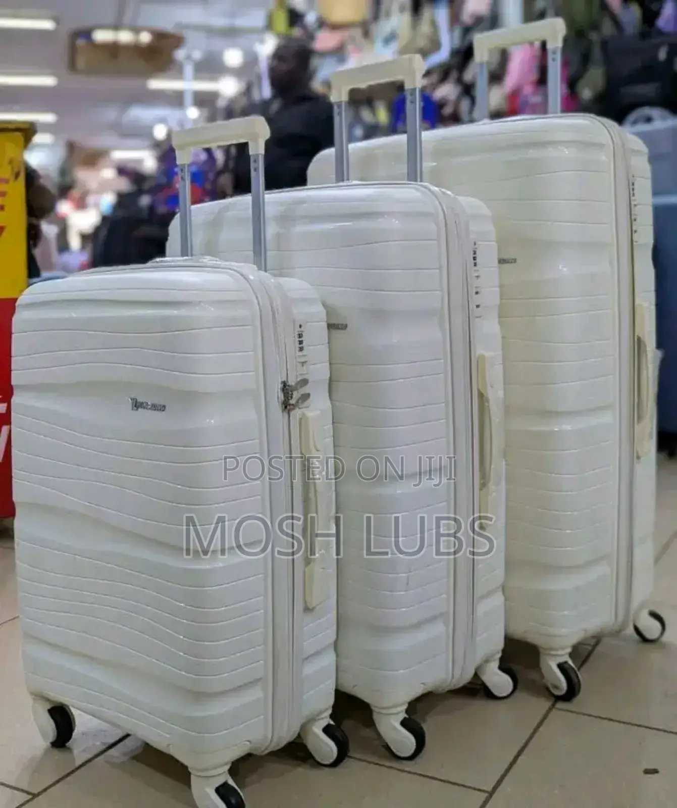 A Pack of 3 Plastic Travel Suitcases