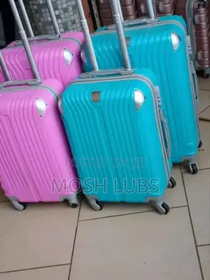 3 Safari Travel Suitcases