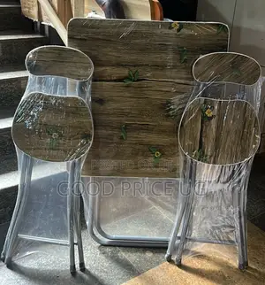 Foldable Table and Chair Set Featuring a Rustic Wooden