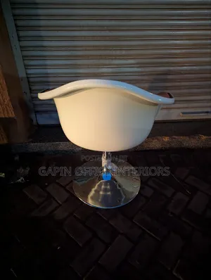 Saloon Chair// Office Chair With Adjustable Heights. Negotiable