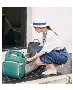 Diaper Bag/Nappy Changing Bag With A Multifunctional Travel Basinet