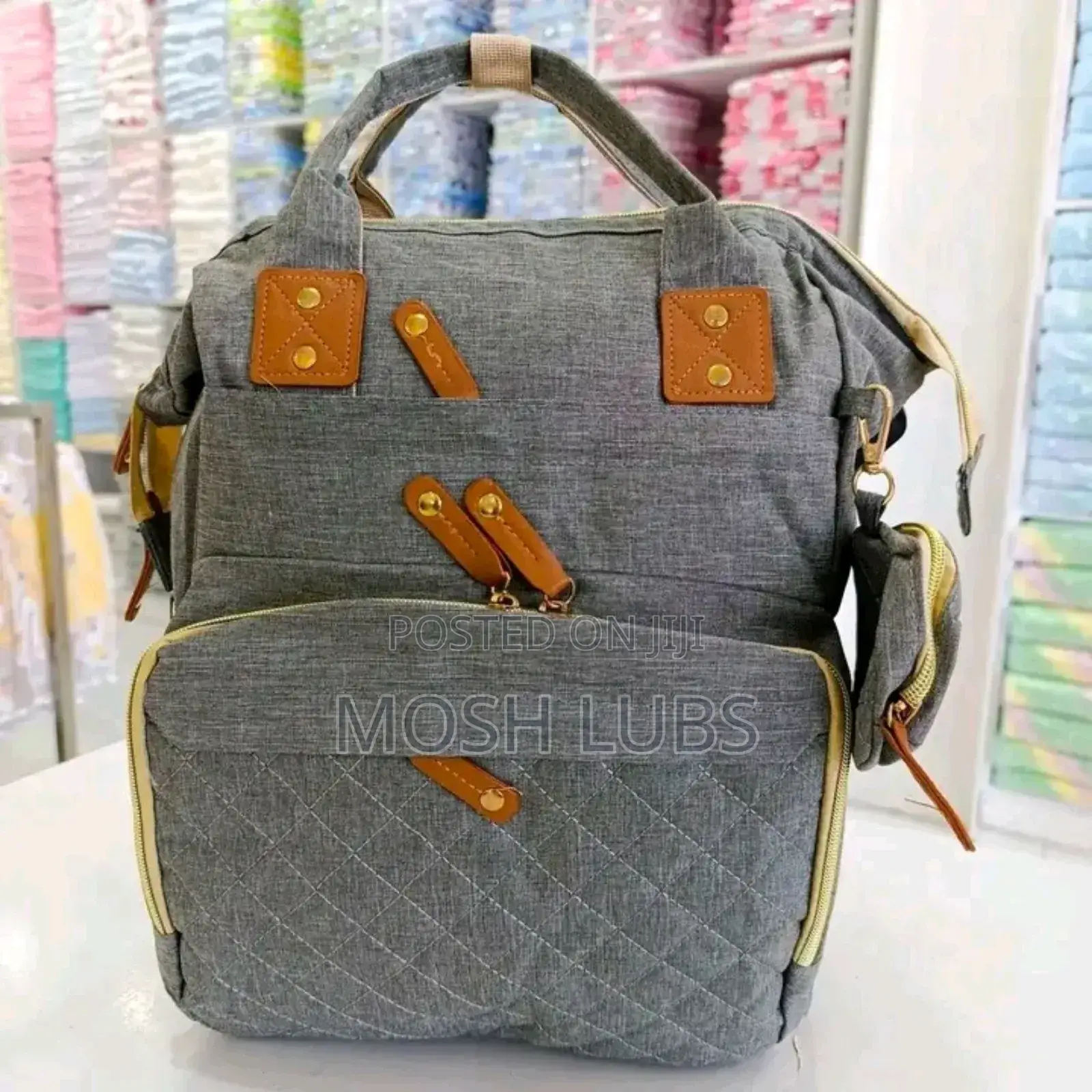 Diaper Bag/Nappy Changing Bag With A Multifunctional Travel Basinet