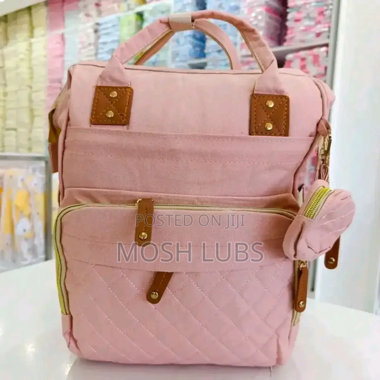 Diaper Bag/Nappy Changing Bag With A Multifunctional Travel Basinet