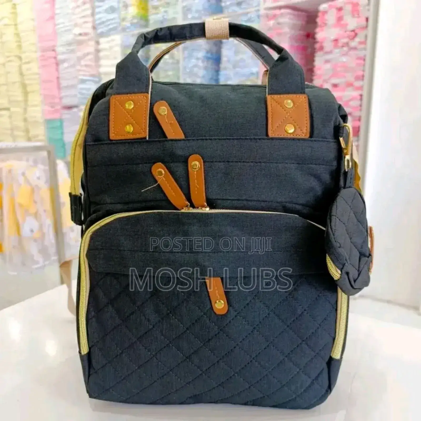 Diaper Bag/Nappy Changing Bag With A Multifunctional Travel Basinet