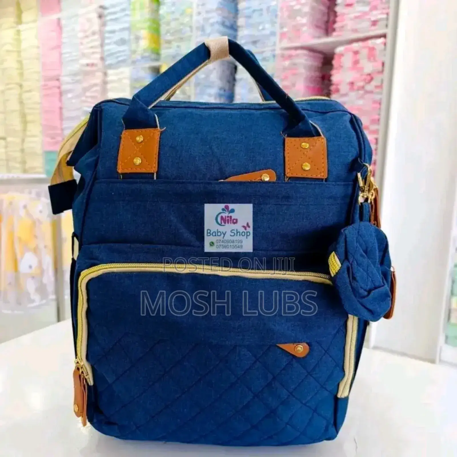 Diaper Bag/Nappy Changing Bag With A Multifunctional Travel Basinet