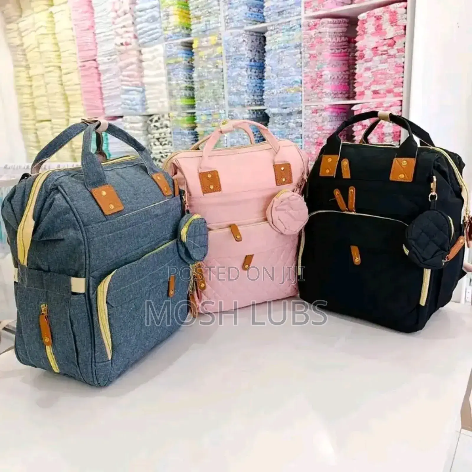 Diaper Bag/Nappy Changing Bag With A Multifunctional Travel Basinet