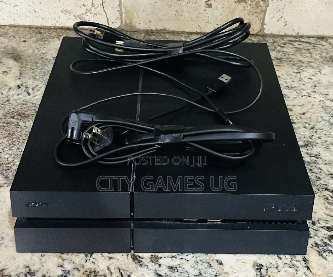 Sony Playstation 4 Black Console With 2 Controllers and 10games