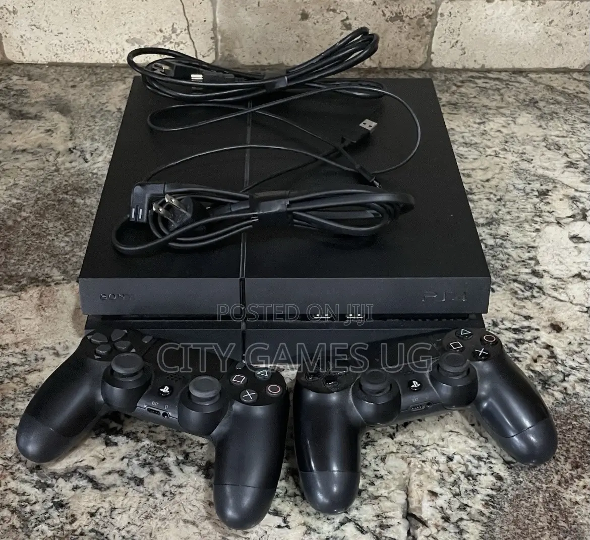 Sony Playstation 4 Black Console With 2 Controllers and 10games