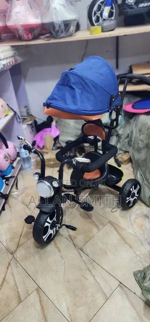 Kids Push Tricycles With Umbrella