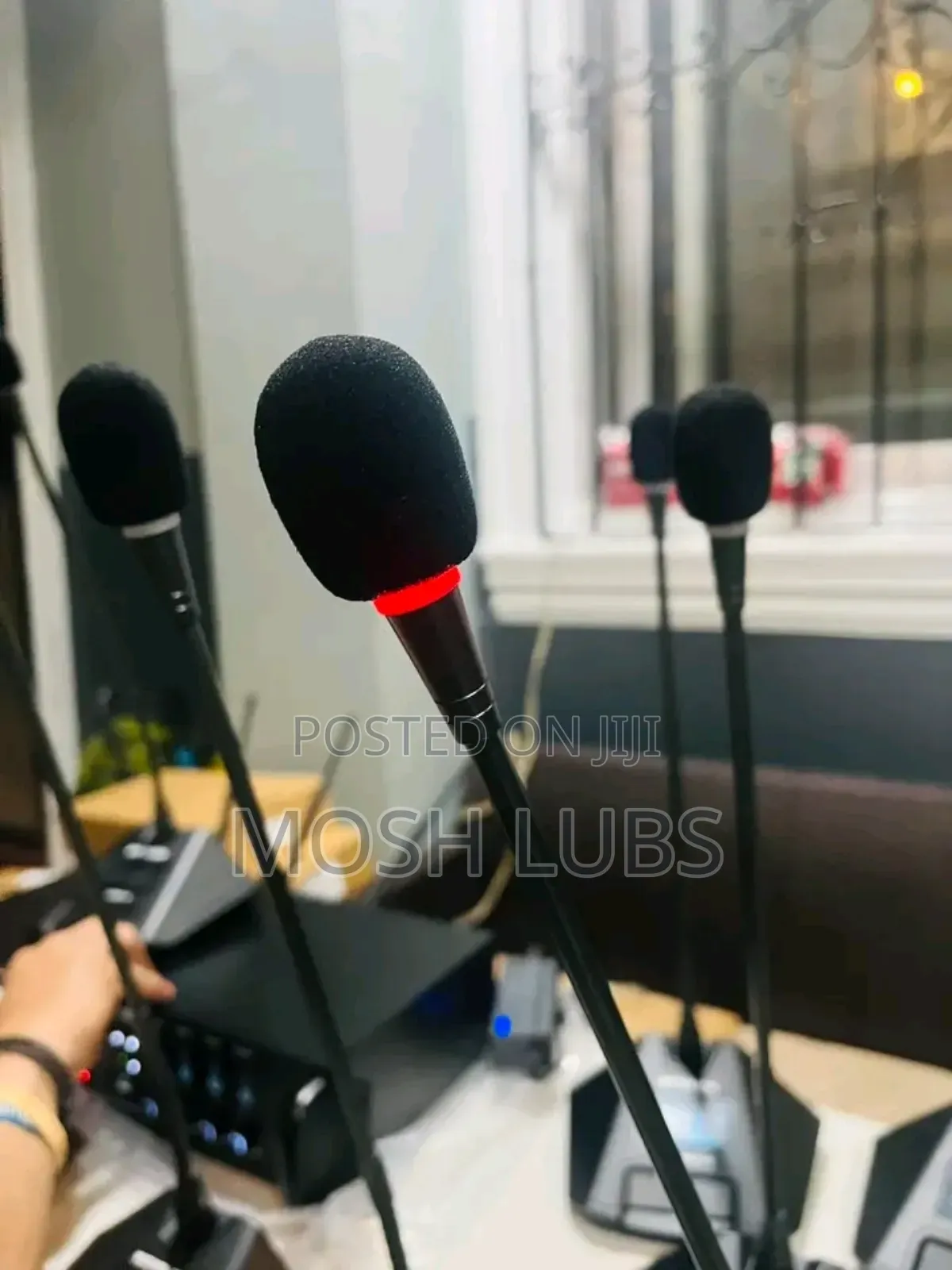 Retractable Desktop Microphones for Conferences