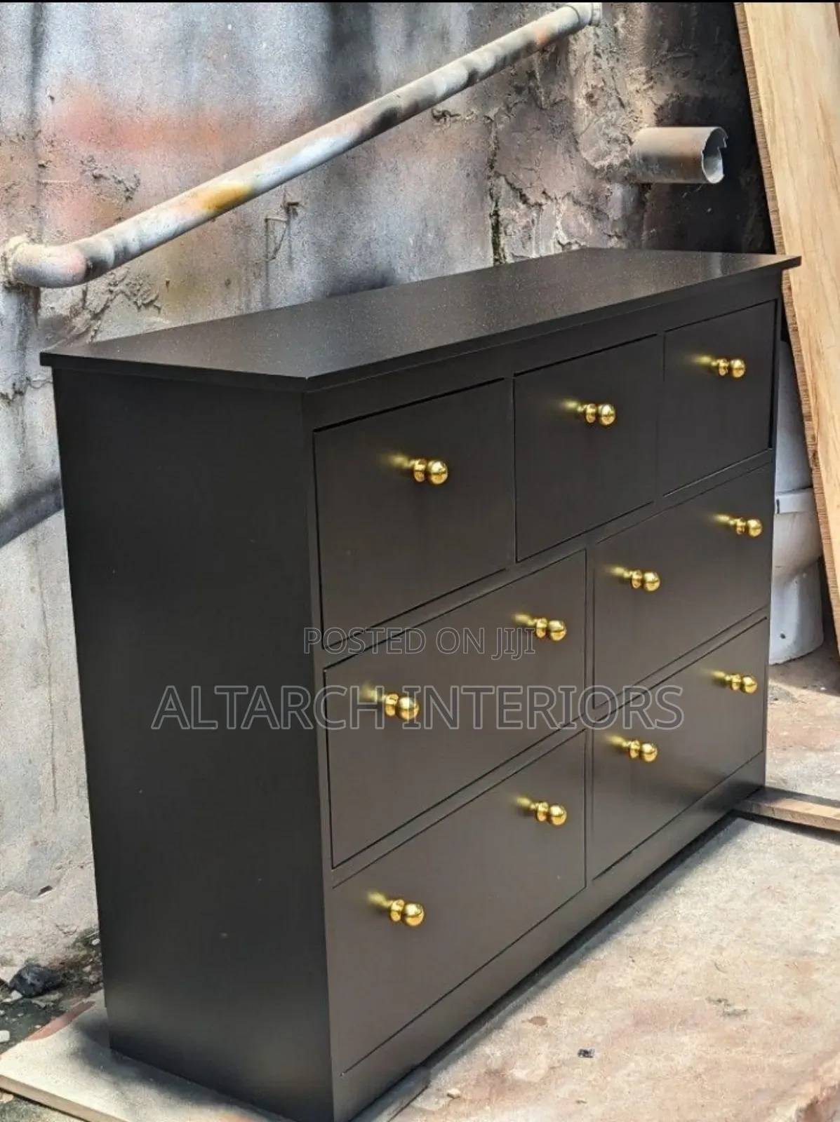 Well Finished Chest of Drawers in Color Black With Golden Handles
