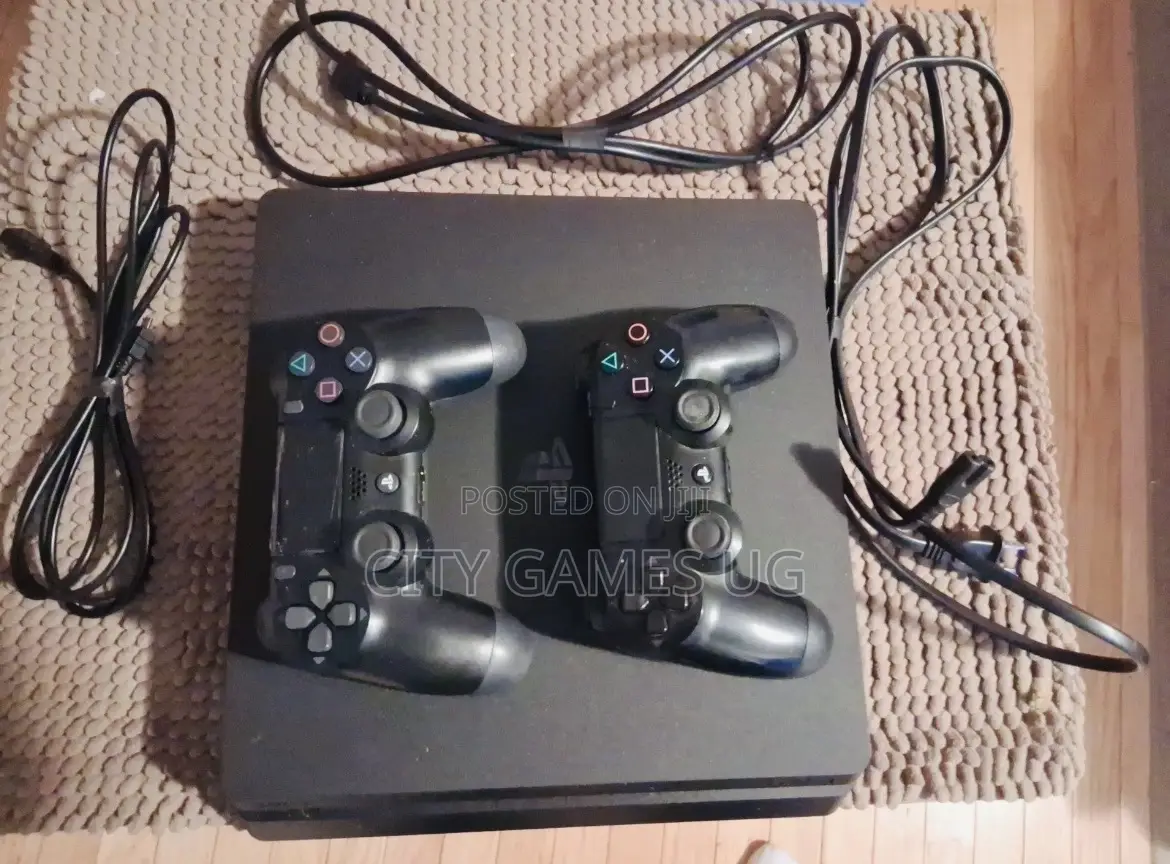 Playstation 4 Slim With 10 Popular Games/ 2 Controllers.