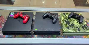 Super Clean Playstation 4 Slim - Cheapest on Jiji - 13 Games + 2 Pads.