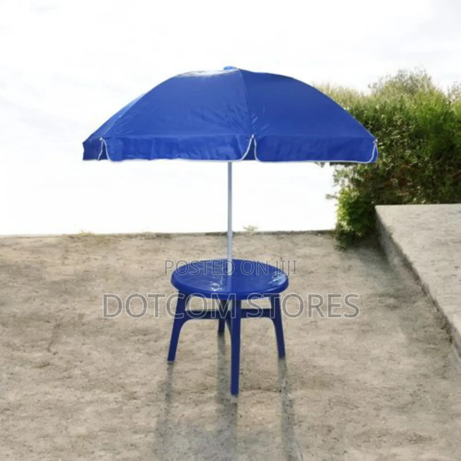 Outdoor Plastic Furniture, Including a Table and an Umbrella