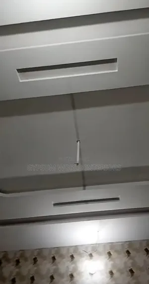 Gypsum Ceiling Work on Filling and Sanding