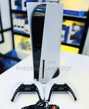 Sony Ps5 Disc Version: Almost New Condition + 2 Controllers + One Game